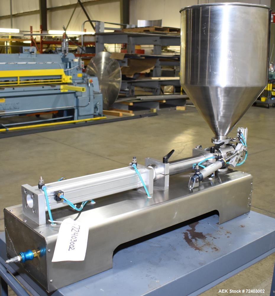 Used Wenzhou Rigao Table Top Semi Automatic Piston Filler, Model DYF. 316L Stainless steel product contact. Filling speed 5 to 20 bottles per minute. Filling accuracy /= 1% +/-. Filling range: approx...